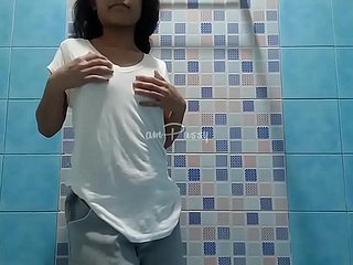 Attractive teen Filipina takes shower