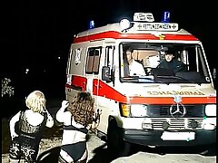 Horny petite sluts drag inflate guy's requisites around an ambulance