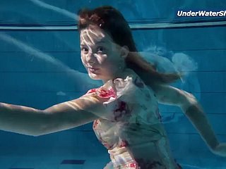 Slow motion teenage woman anent Czech swimming